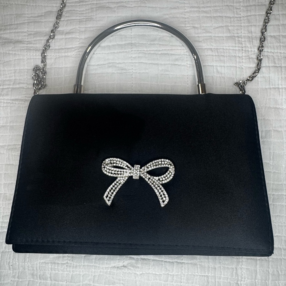 Elegant Black Handbag with Silver Bow Accent